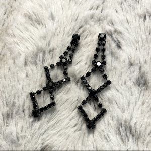 Black crystal geometric drop down earrings